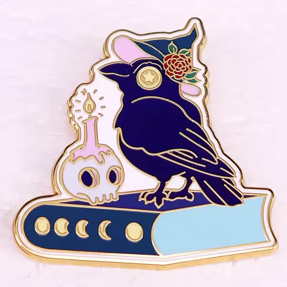 Raven on Book with Candle Enamel Pin – Witchy Gothic Magic Accessory